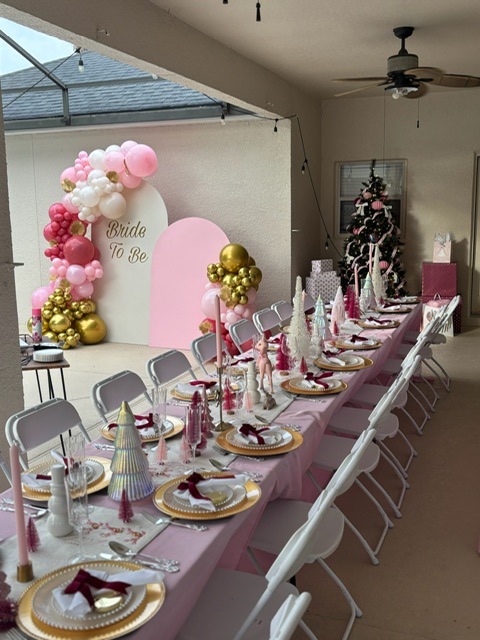 Bride to Be pink and gold balloon arch with elegant pink tablescape for a bridal shower
